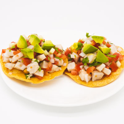 Una tostada de Ceviche de Pescado