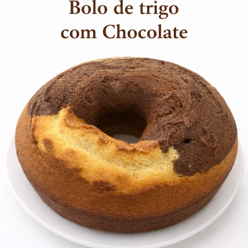 Bolo de Trigo, com a massa de creme de leite, adicionado Chocolate em pó, não usamos conservantes, fabricação diaria. Serve de 10 a 12 fatias.