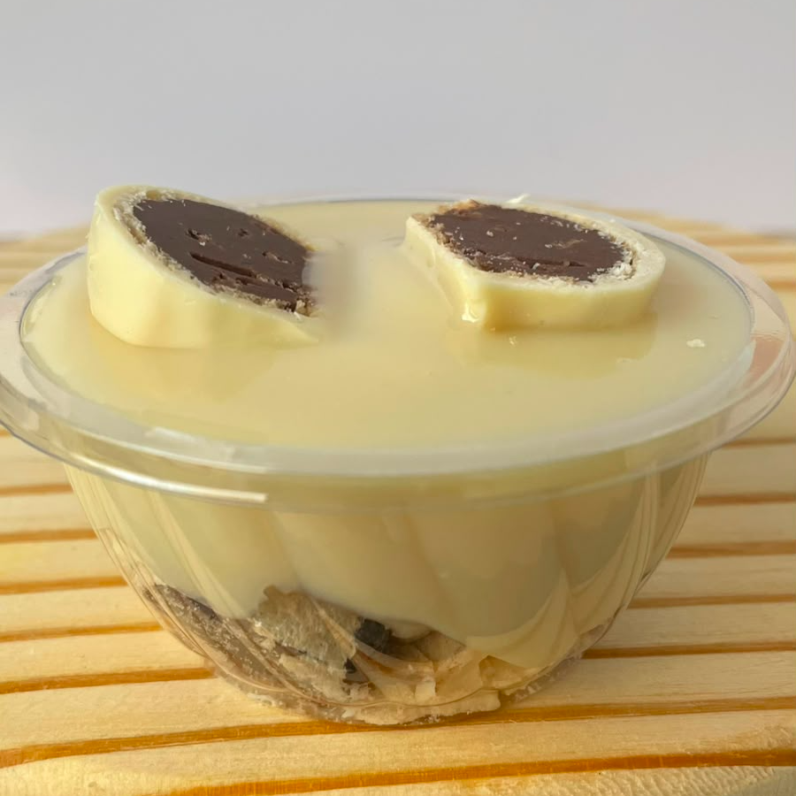 Bombom ouro branco, creme de ninho, ganache de chocolate branco. Apróx. 150g
