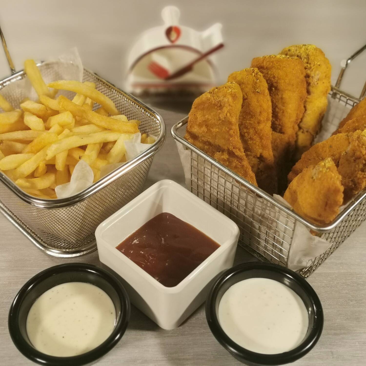 8 lemon pepper tenders con papas