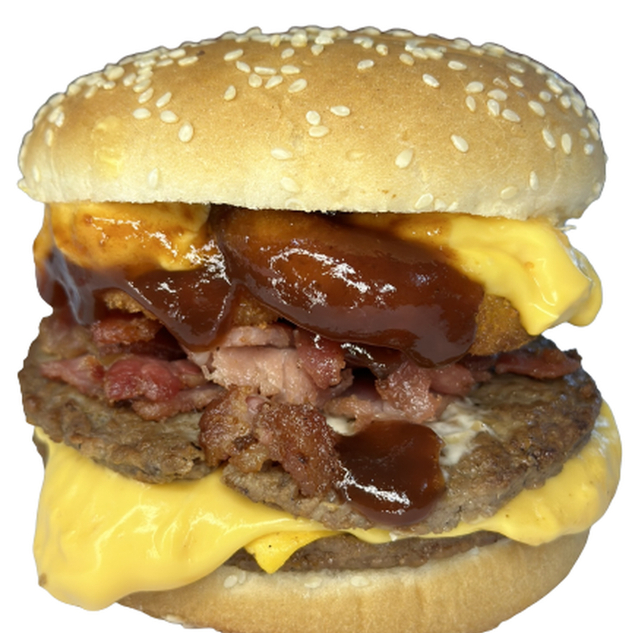 Pão, 2 carnes sabor picanha (120gr), aneis de cebola, bacon, creme de cheddar da casa e barbecue