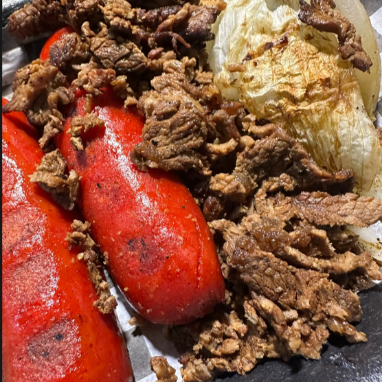 1/2 Kg Espaldilla (Salchicha, cebollas, tortillas)