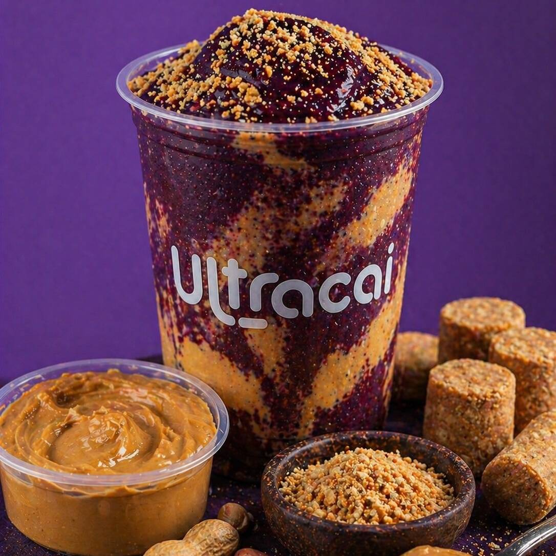Smoothie Açaí Paçoca Lovers
Uma combinação irresistível para quem ama sabores intensos e marcantes. Nosso açaí é batido com leite integral, pasta de amendoim e paçoca, resultando em uma textura extremamente cremosa, encorpada e cheia de personalidade.
O sabor único do amendoim se mistura ao açaí, criando um equilíbrio perfeito entre o doce e o tostado, proporcionando uma experiência indulgente e envolvente a cada colher.
Finalize do seu jeito escolhendo seus complementos favoritos e deixe essa combinação ainda mais especial.
*Todos os complementos são batidos junto no copo não sendo possivel enviar a parte*