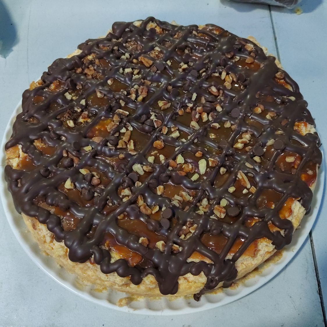 Pay de Queso con cajeta, chocolate y nuez