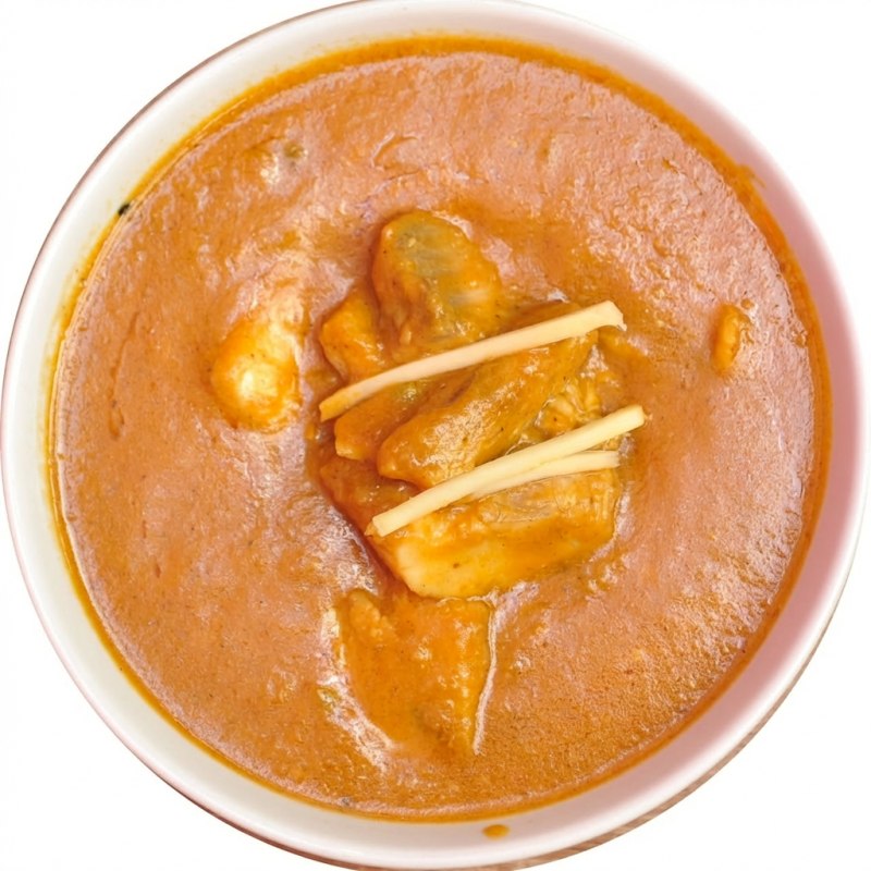 Peixe cozido em molho curry e leite de coco.