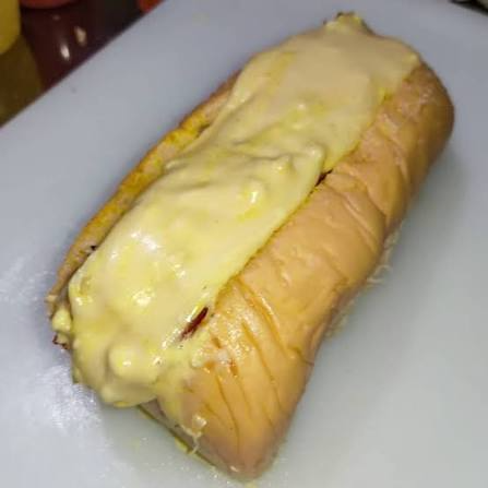 Perro Gratinado + Bebida Gratis