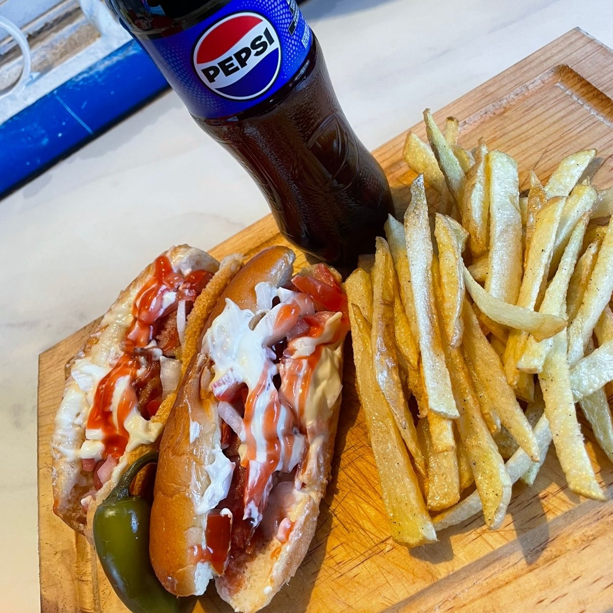 Combo. de 2 Hot Dogs Sencillos Papas y Soda