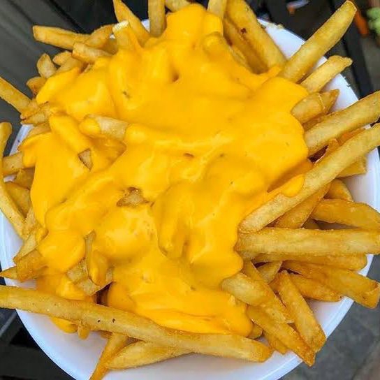 Papas a la Francesa Con Queso Derretido