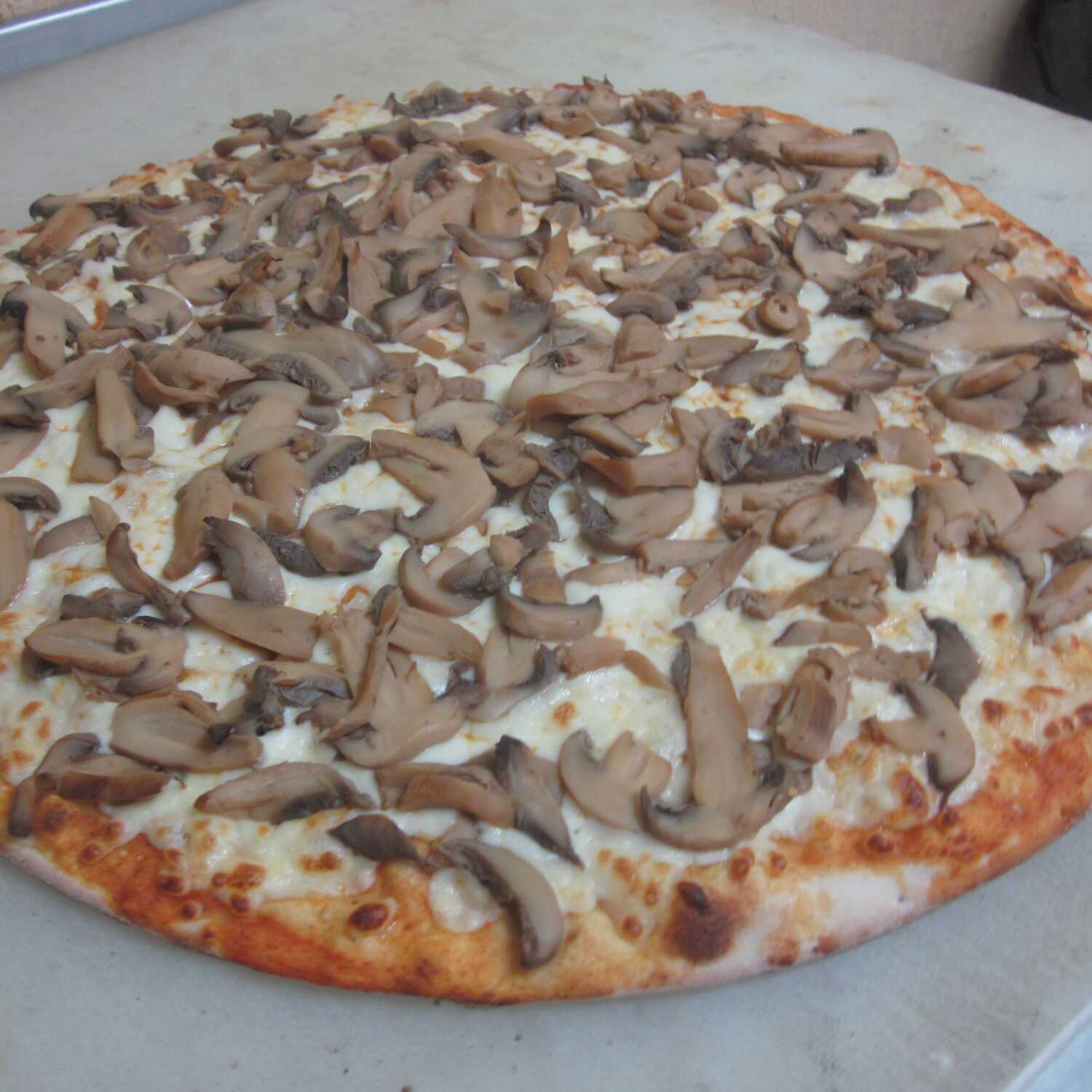 PIZZA INDIVIDUAL CHAMPIÑÓN