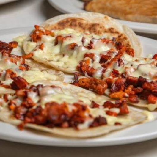 Taco con Queso de Pastor