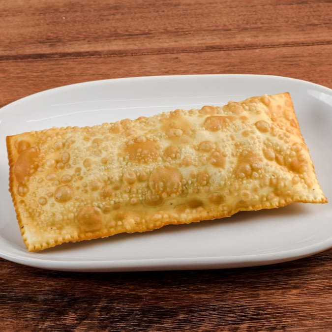 Massa artesanal Elite, Frango bem temperado e suculento com bastante recheio.