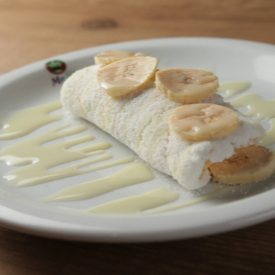 Tapioca feita com Massa artesanal, banana e leite condensado
