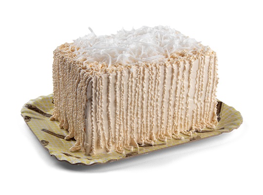 Bolo de massa branca integral, recheios de cocada e mousse branca zero adição de açúcares com pedaços de abacaxi, cobertura de mousse branca zero adição de açúcares com coco ralado.