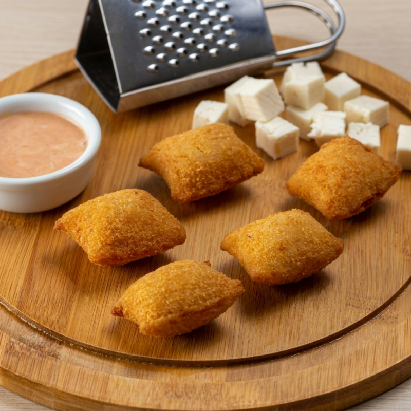 Recheio de queijo coalho,povilhado com queijo ralado