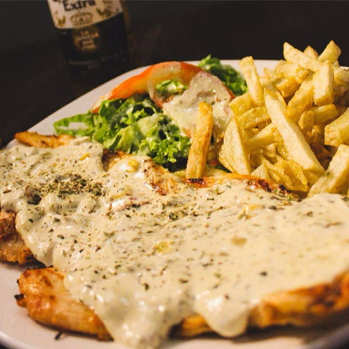 Pollo en salsa de champiñones