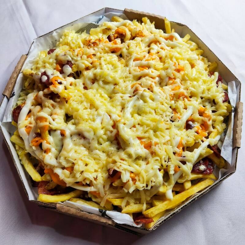 900g De Batata ,Mussarela, Bacon, Catupiry, Cheddar e Calabresa.