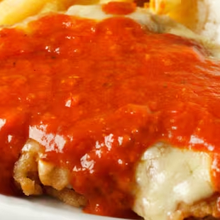 Acompanha: salada verde, arroz e feijão.