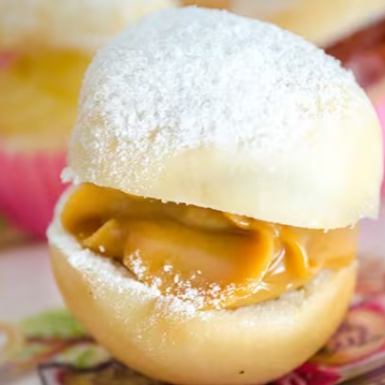 Mini sonho doce de leite, aproximadamente 100gr.