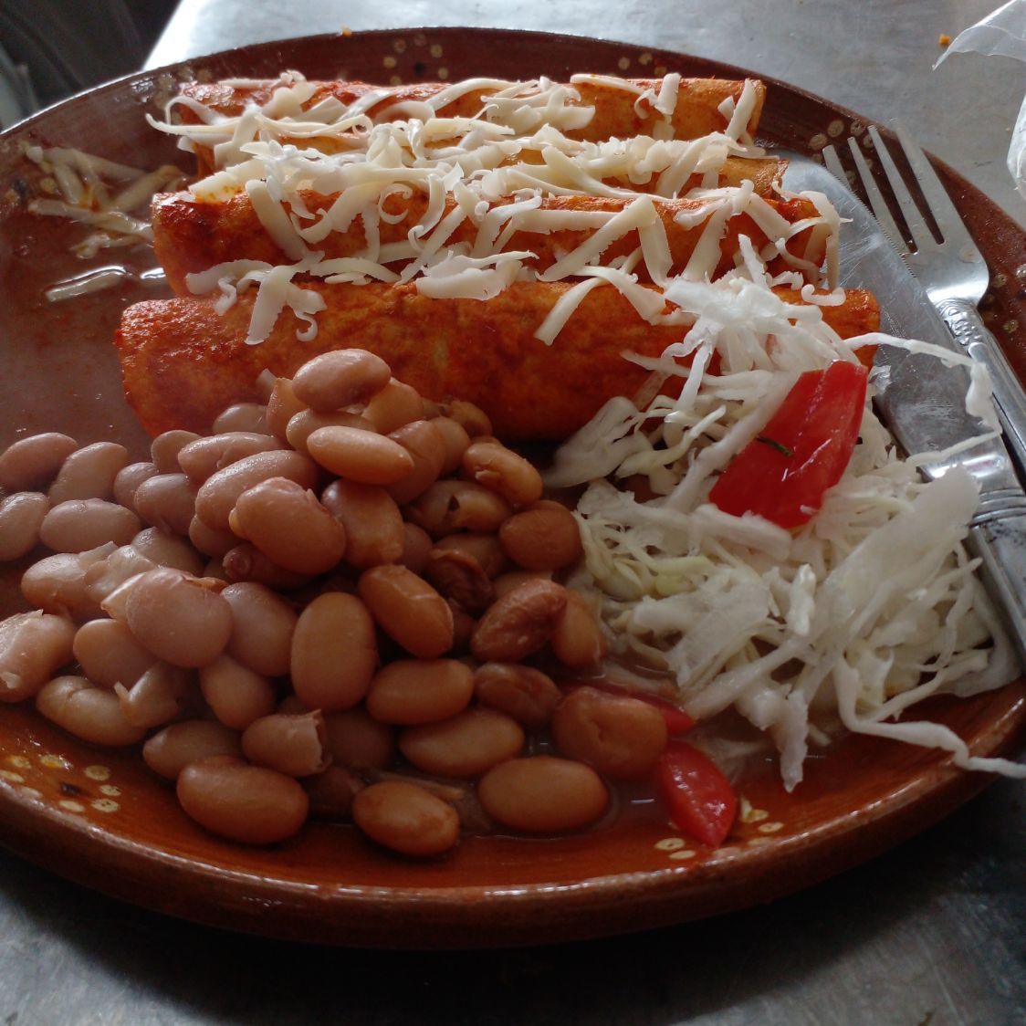 Combo enchiladas con queso y 1 Coca Cola