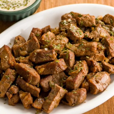 Arroz, fritas, farofa e molho à campanha
