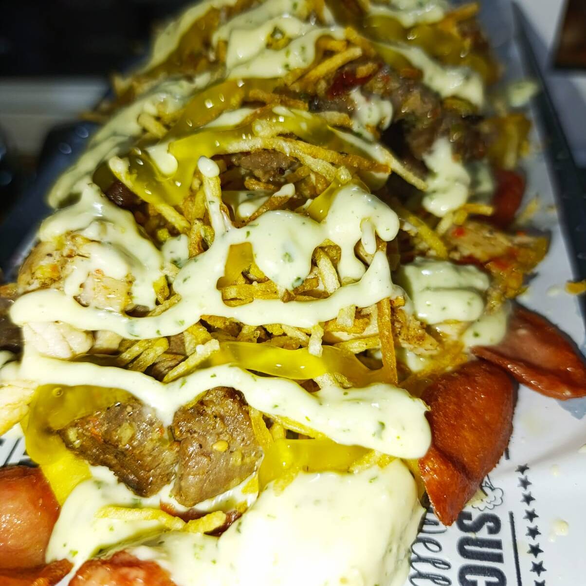 Salchipapa Pollo Suiza