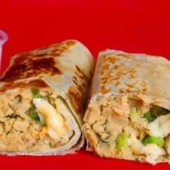 Tortilla de trigo levemente tostada, enrolada com recheio de chilli de soja c tempero mexicano, queijo, tomate e manjericão. Não acompanha molho a parte