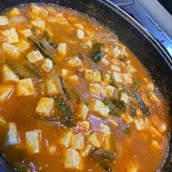 Rajas de chile poblano con queso en jitomate