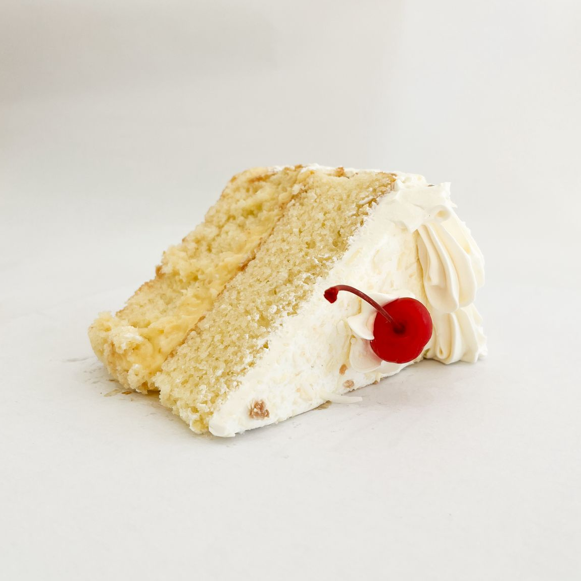 REBANADA DE PASTEL DE COCO