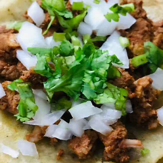 Taco de carne adobada de cerdo