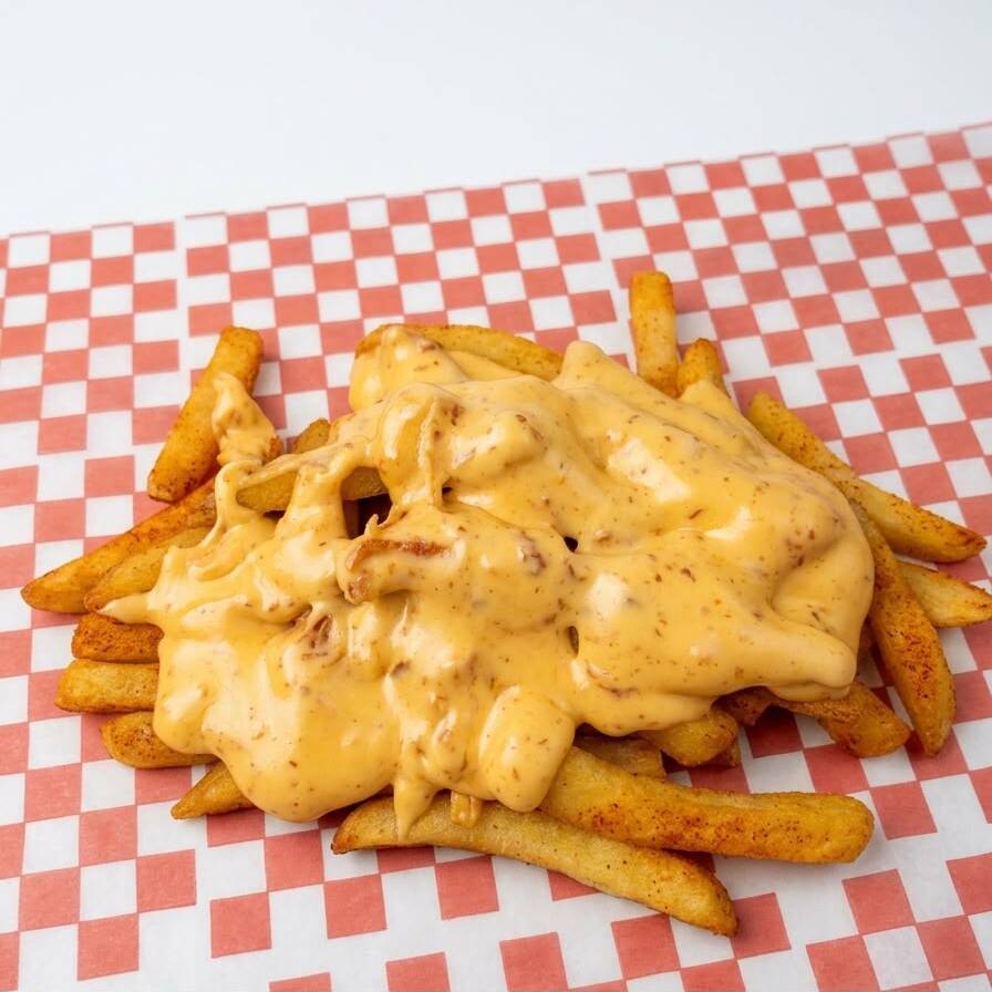 Papas con Queso Cheddar