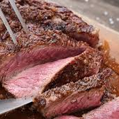 Churrasco con papas y chimichurri