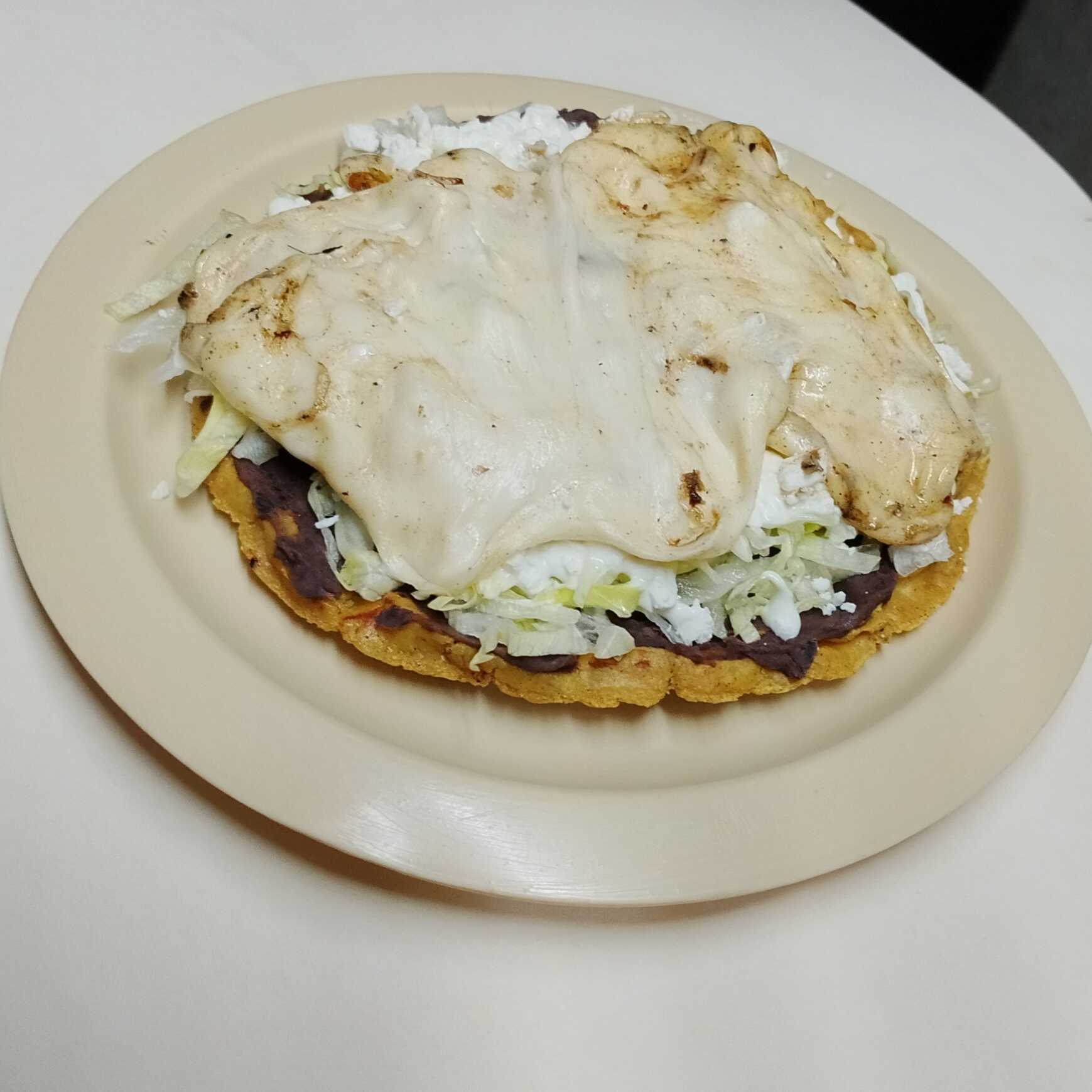 Sope con Quesillo.