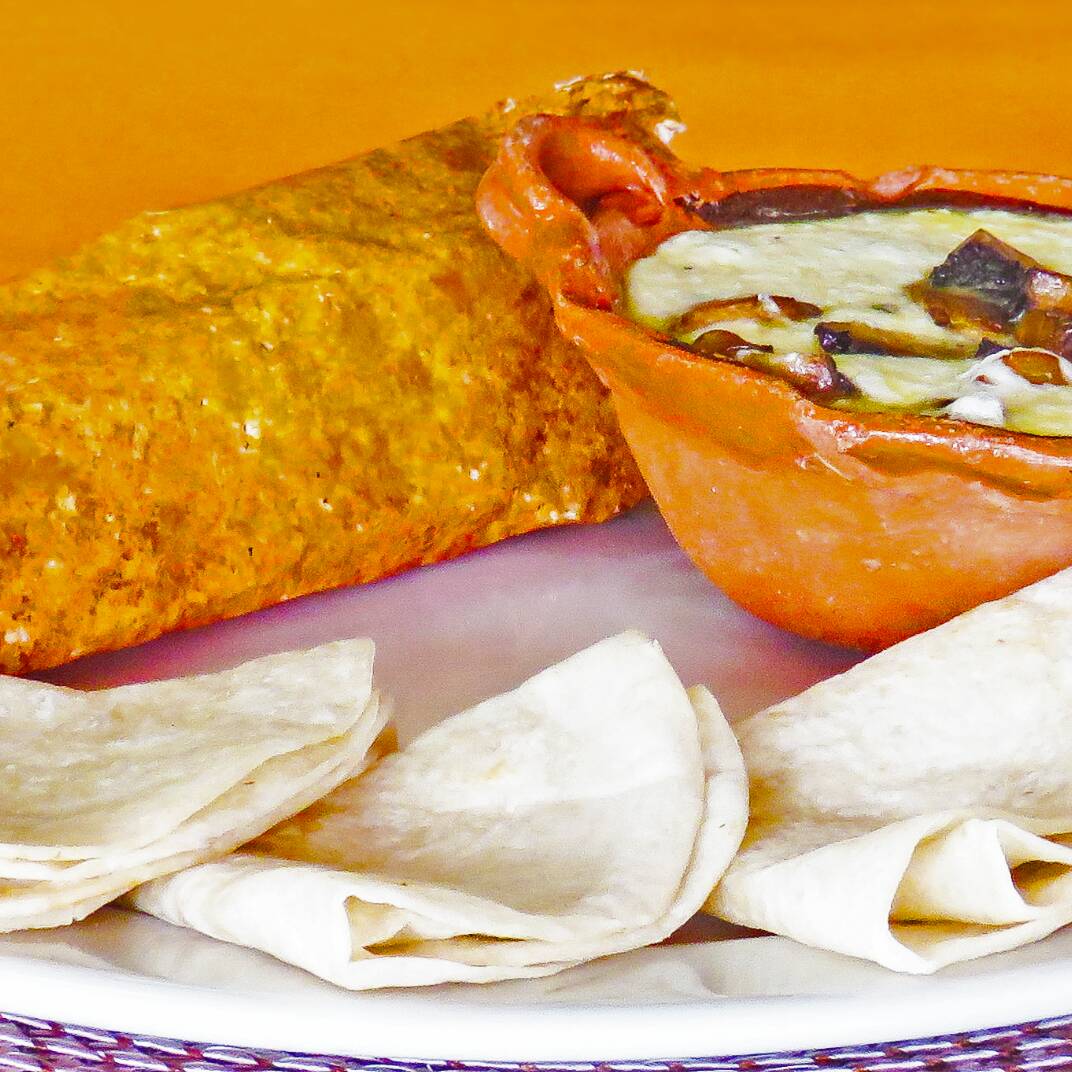 Queso Fundido con Champiñón