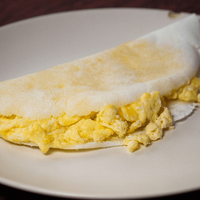 Tapioca com 2 ovos mexidos, bacon e catupiry
