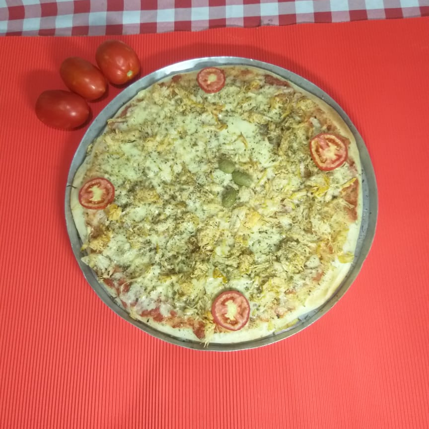 molho de tomate artesanal, mussarela, frango, orégano e azeitona
