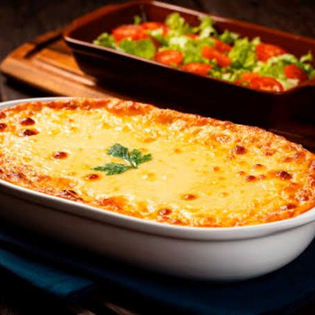 Purê de batata + Strogonoff de frango + Queijo gratinado = Perfeição