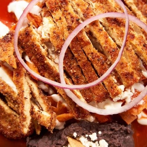ROJOS CON MILANESA