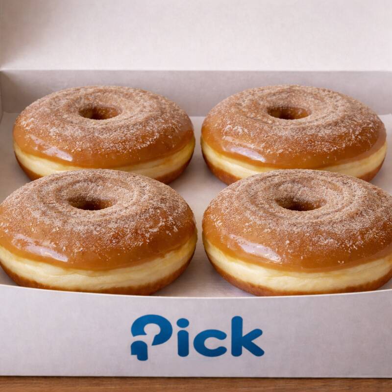 4 donuts de churros, vai doce de leite açúcar e canela.