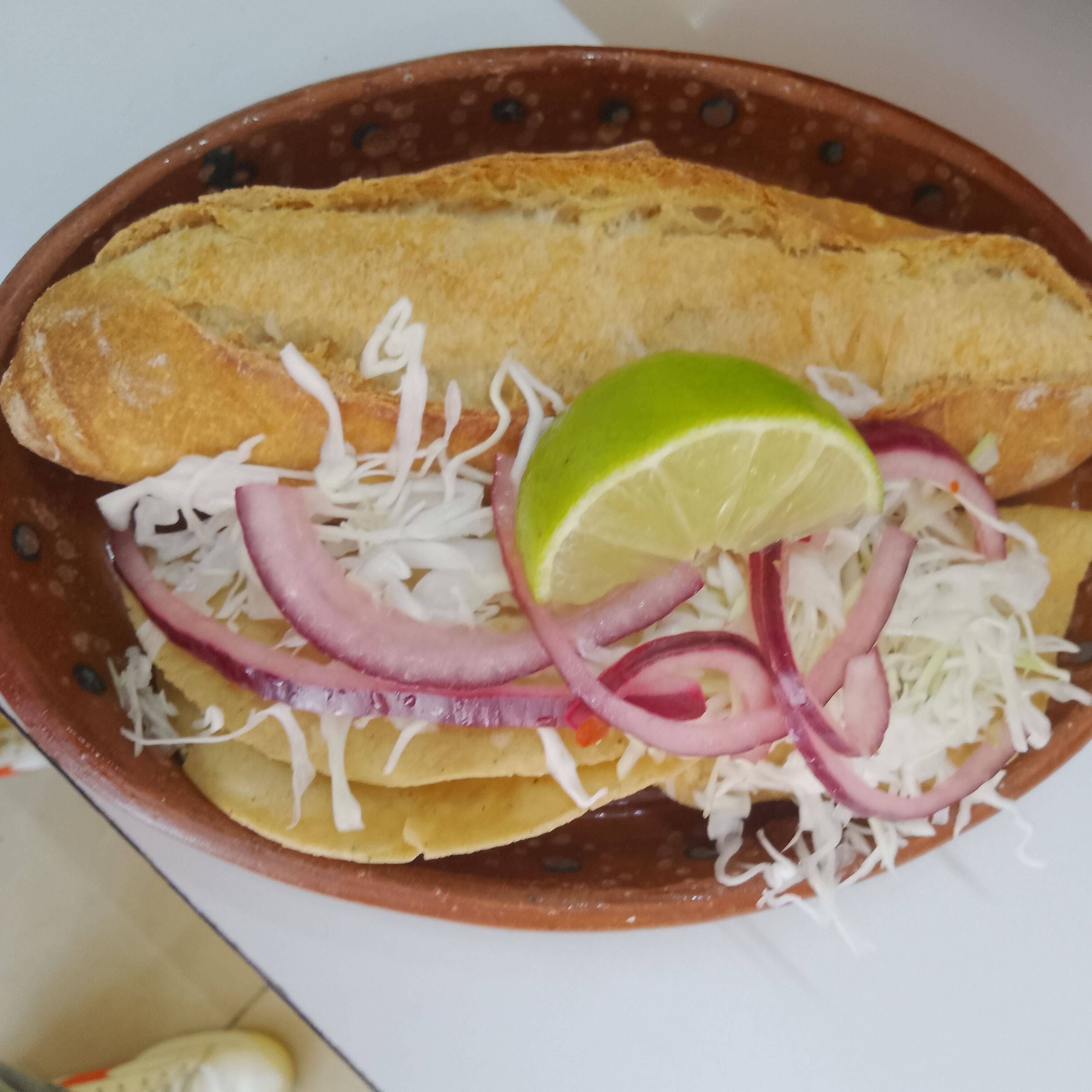 Combo Torta + 2 Tacos Dorados