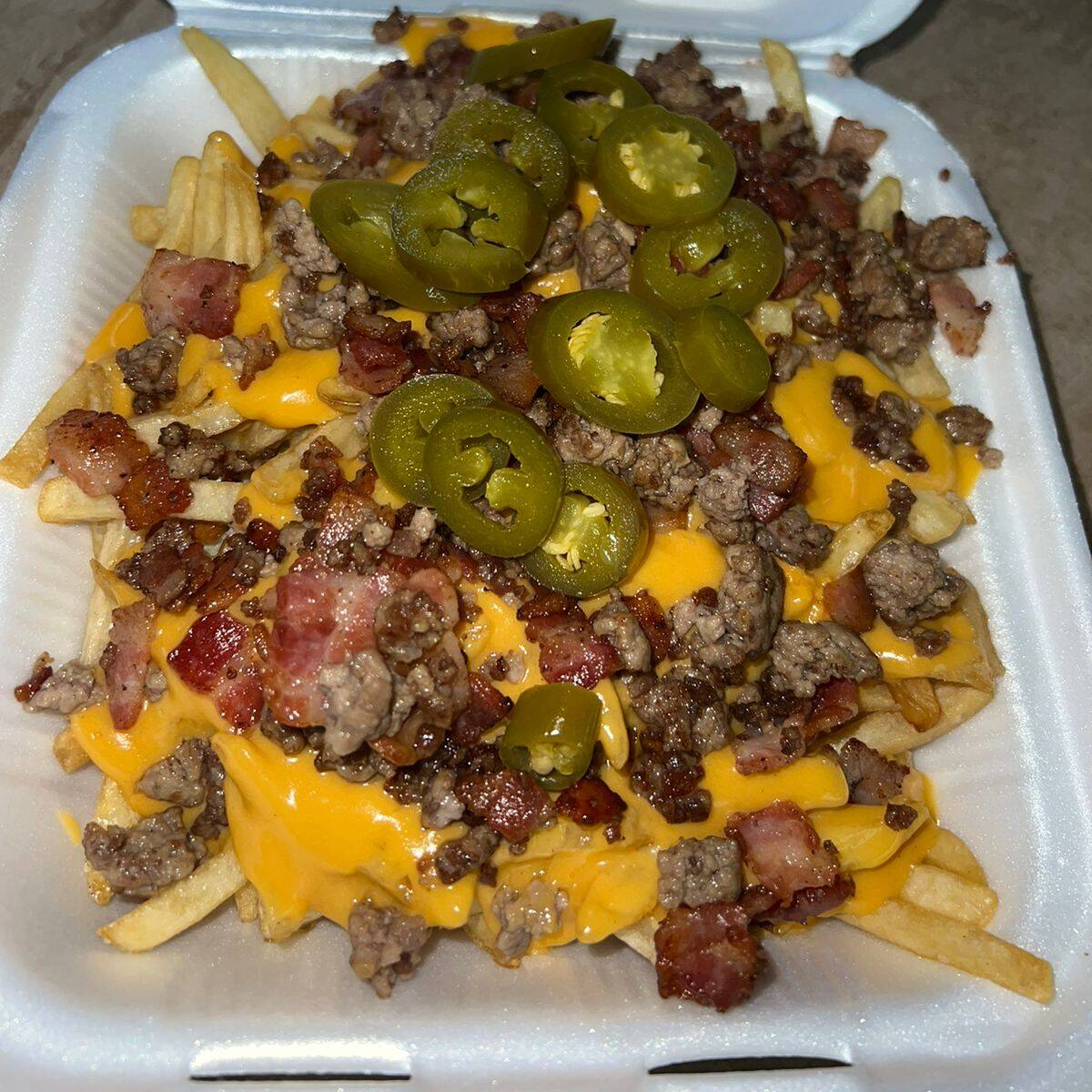 Media Orden de Nachos Supremos.