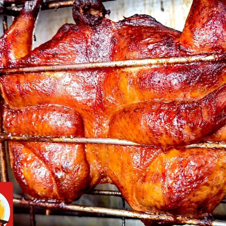 Medio Pollo a la Naranja
