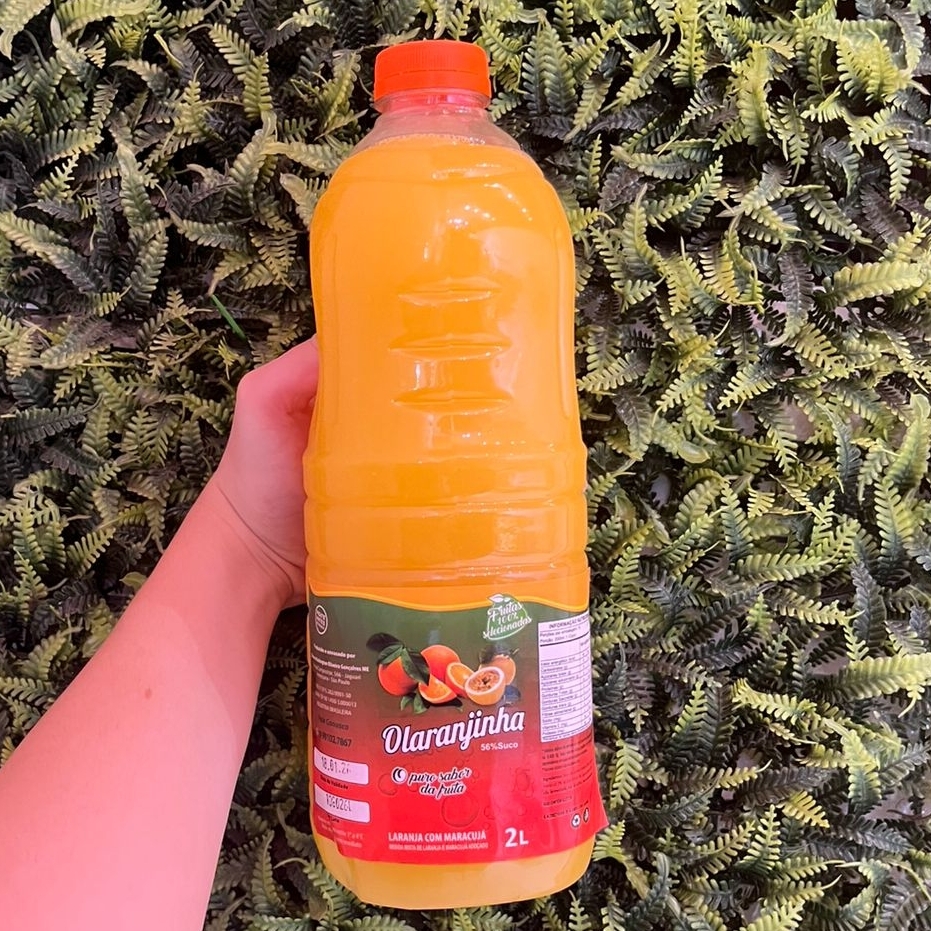 Suco de laranja com maracujá natural Laranja, maracujá, água e açúcar O Puro Sabor da Fruta