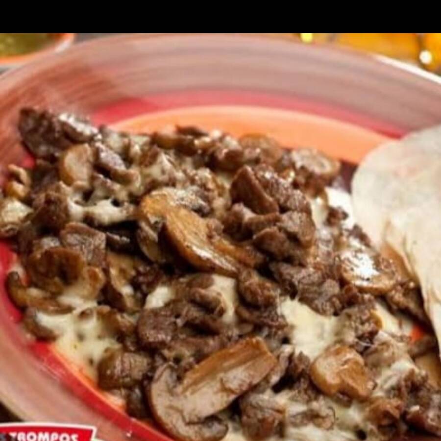 Bistec con Champiñones