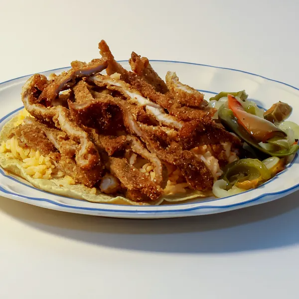 Taco Mega Acorazado de Milanesa de Cerdo