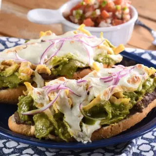 Molletes con Chilaquiles Ham And Mozzarella