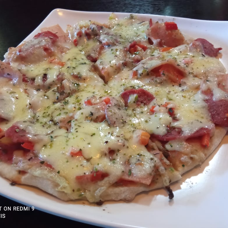 Pizza grande + Gaseosa