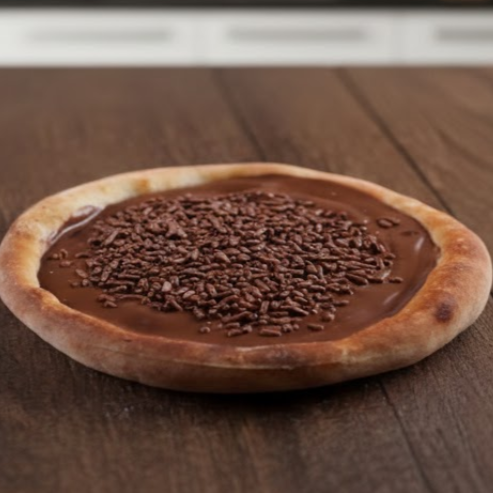 Chocolate ao leite decorado com chocolate granulado.