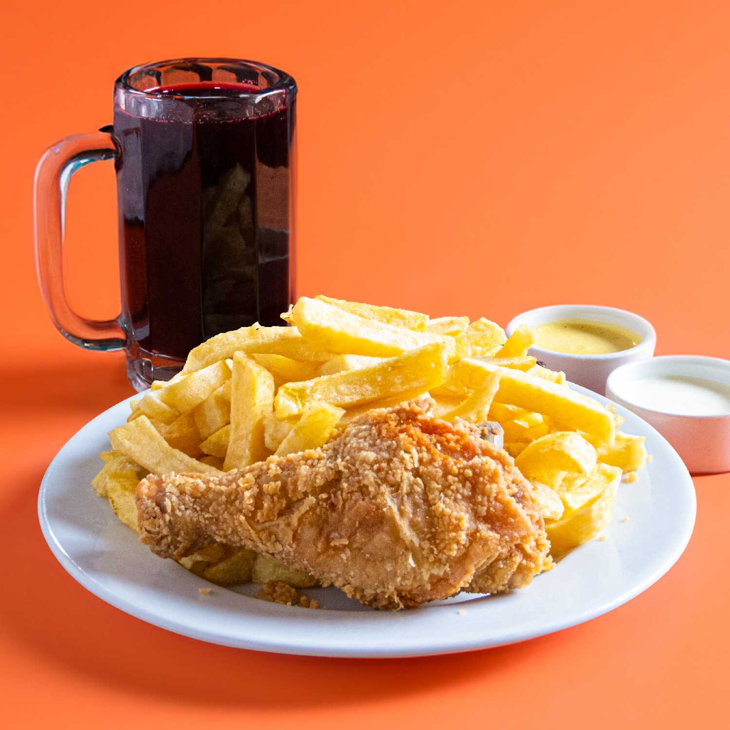 Broaster + papas + chicha morada