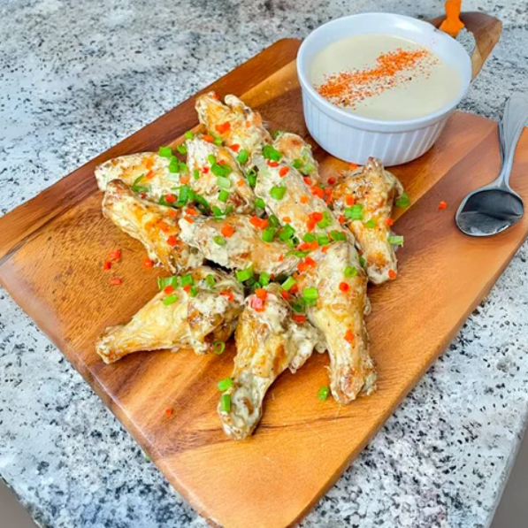 Alitas Acevichadas + Papas Fritas