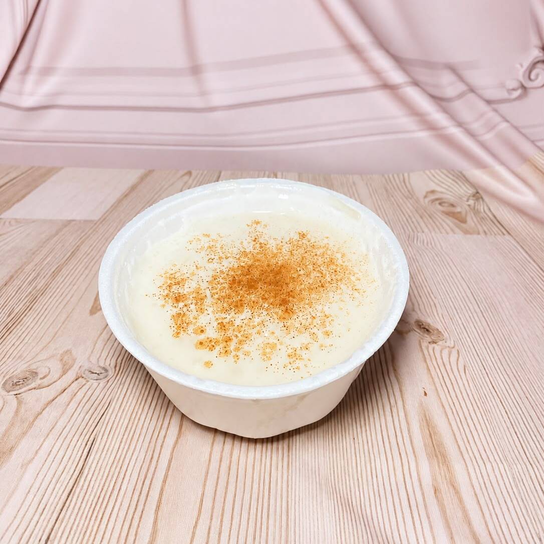 Canjica cremosa preparada com côco, leite, leite de côco e leite condensado, com um sabor irresistível. 300ml